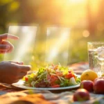 Person setting digital boundaries to enjoy a healthy meal and nature, promoting well-being