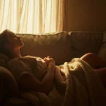 Person taking a refreshing power nap in a cozy, sunlit room